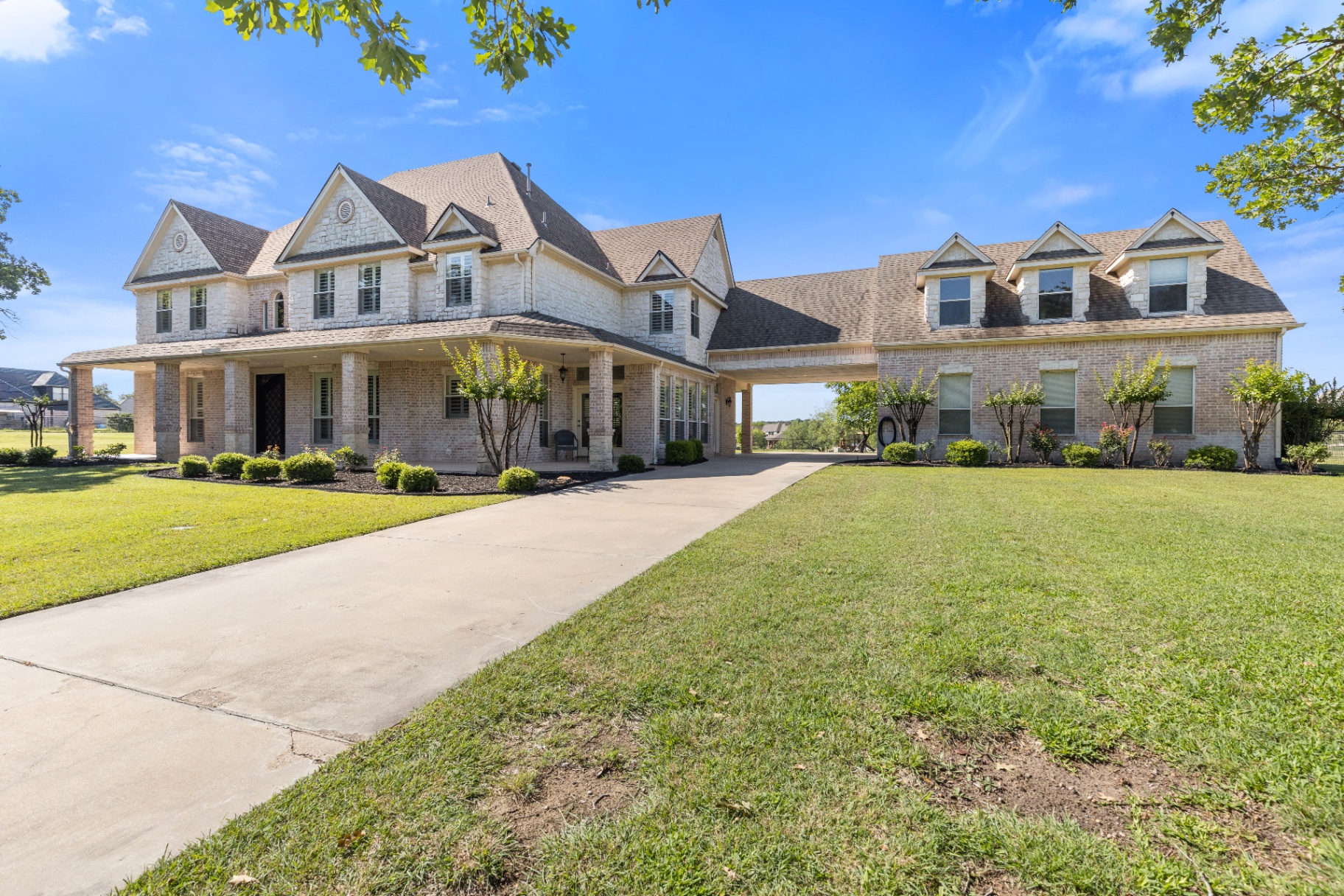 Wide front elevation of the brick estate