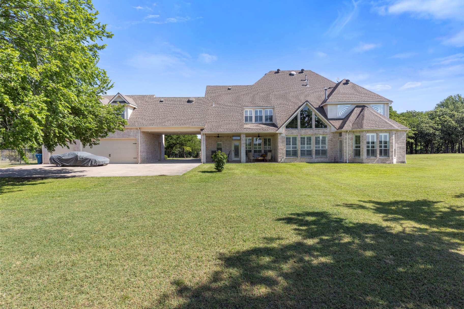 Wide rear elevation with covered patio