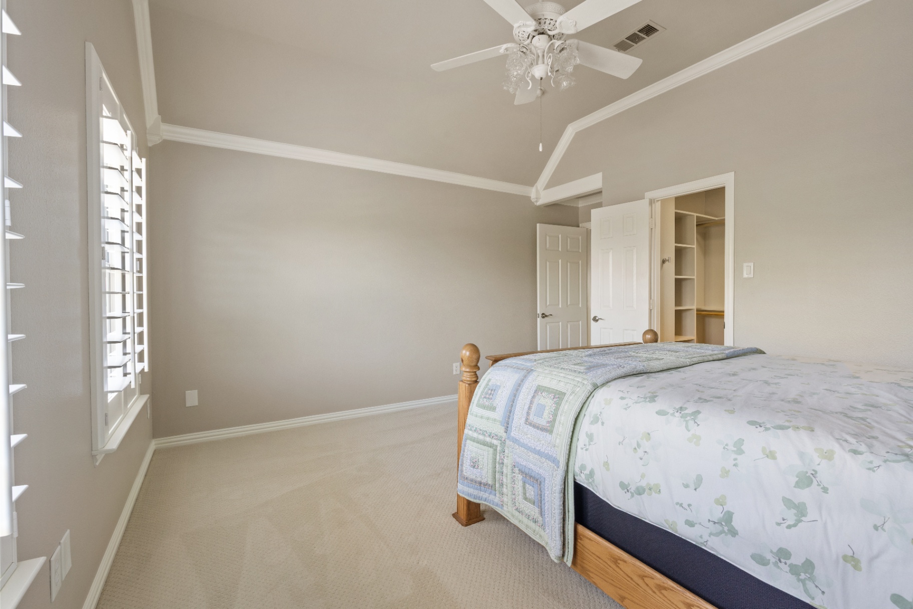 Secondary bedroom with walk-in closet