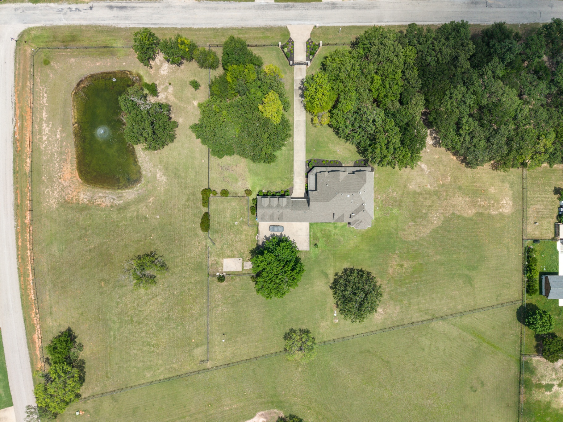 Top-down aerial of home and tank