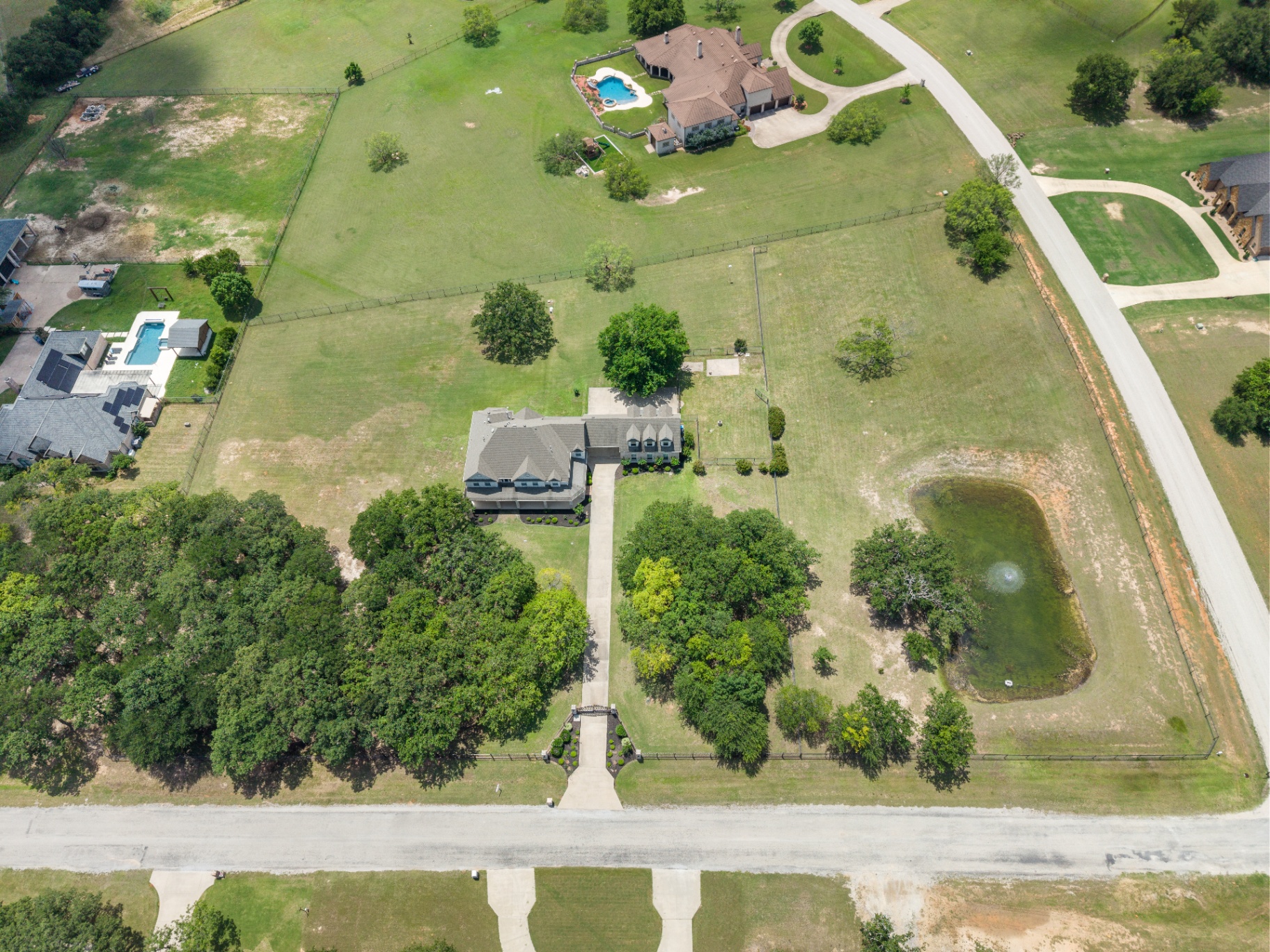 Wide aerial along the corner lot